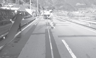 写真- 11 クラック防止シート張り状況