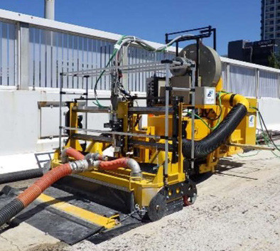 移動式コンクリート床版損傷部撤去装置 移動式オートチッパー工法