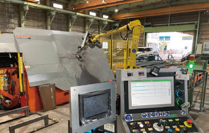 写真-2 鉄筋自動加工機