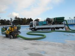 薄層切削用ドラムおよび廃材同時吸引・排出装置